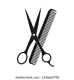 Hairdressing scissors and comb black silhouette icon