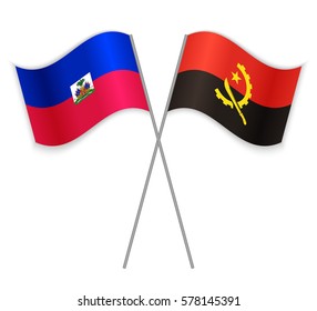 Haitian and Angolan crossed flags. Haiti combined with Angola isolated on white. Language learning, international business or travel concept.