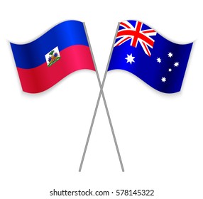 Haitian and Australian crossed flags. Haiti combined with Australia isolated on white. Language learning, international business or travel concept.