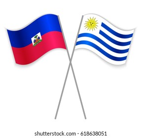 Haitian and Uruguayan crossed flags. Haiti combined with Uruguay isolated on white. Language learning, international business or travel concept.