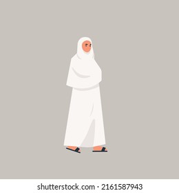 Hajj woman in pillgrimse tradition clothes