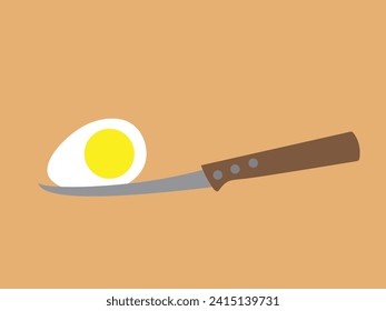 Half of a boiled egg on a knife