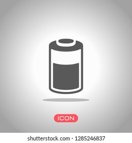 Half charged battery, technology icon. Icon under spotlight. Gray background