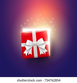 Half open Christmas gift box with magical lights and Merry Christmas letters. Surprise concept. 