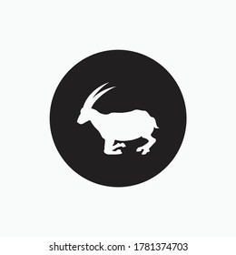 half stand goat isolated on black circle - san clemente island goat, sheep, lamb logo emblem or button icon silhouette - mammal, animal vector icon