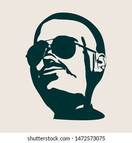 Half turn view portrait of a mustache man wearing sunglasses