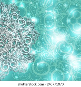 Half of white snowflake with abstract floral pattern on cyan background with place for your text