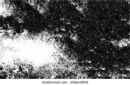 Halftone abstract background. The monochrome texture of dots of ink. Grunge pattern for printing and creating design