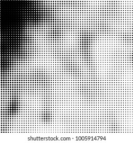 Halftone black and white abstract pattern of dots in black on a white background
