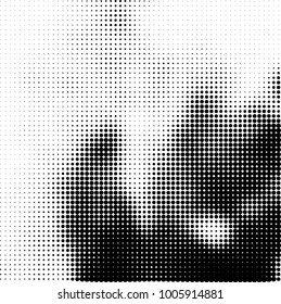 Halftone black and white abstract pattern of dots in black on a white background