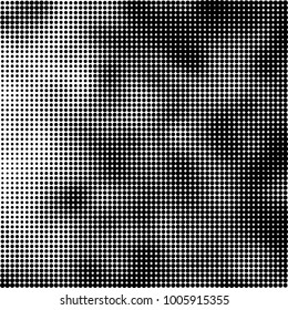 Halftone black and white abstract pattern of dots in black on a white background