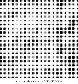 Halftone black and white abstract pattern of dots in black on a white background