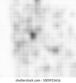 Halftone black and white abstract pattern of dots in black on a white background