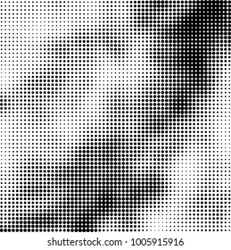 Halftone black and white abstract pattern of dots in black on a white background