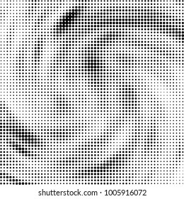 Halftone black and white abstract pattern of dots in black on a white background