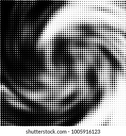 Halftone black and white abstract pattern of dots in black on a white background
