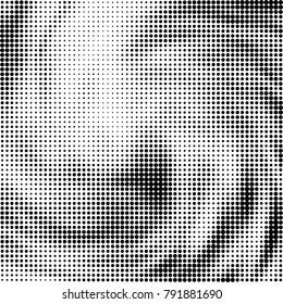 Halftone black and white abstract pattern of dots in black on a white background