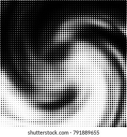 Halftone black and white abstract pattern of dots in black on a white background