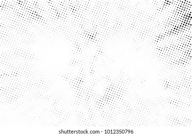 Halftone black and white grunge. Texture of dots scattered on a white background. Abstract pattern in vintage art style print on business cards, badges, labels. Vector monochrome elements