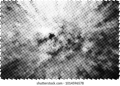Halftone black and white grunge. Texture of dots scattered on a white background. Abstract pattern in vintage art style print on business cards, badges, labels. Vector monochrome elements