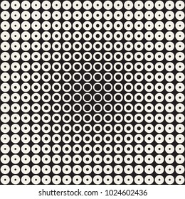 Halftone circles vector seamless pattern. Abstract geometric texture with size gradation of rings. Gradient transition effect monochrome background,