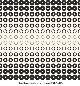 Halftone circles vector seamless pattern. Abstract geometric texture with different sized rings. Monochrome background with gradient transition effect. Modern stylish design for prints, digital, decor