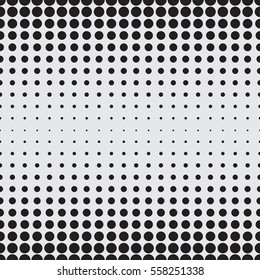 Halftone dots on white background. Vector illustration