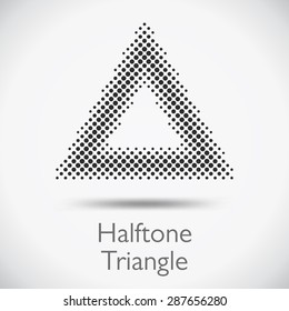 Halftone dots triangle in vector format.