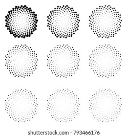 Halftone dotted circles isolated on the white background. Halftone effect vector pattern. Randomly distributed dots for your design.