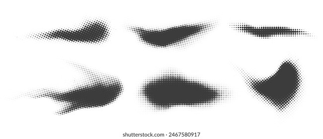 Halftone dotted shapes on white background. Vector paint blob with noisy effect. Abstract splatter stroke shapes. Vector illustration.