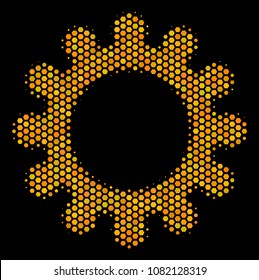 Halftone hexagon Cog icon. Bright gold pictogram with honeycomb geometric structure on a black background. Vector composition of cog icon composed of hexagonal elements.