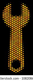 Halftone hexagon Wrench icon. Bright yellow pictogram with honey comb geometric structure on a black background. Vector pattern of wrench icon created of hexagon pixels.