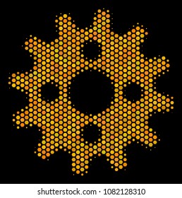 Halftone hexagonal Cogwheel icon. Bright yellow pictogram with honeycomb geometric structure on a black background. Vector concept of cogwheel icon created of hexagonal items.