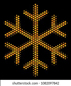 Halftone hexagonal Snowflake icon. Bright gold pictogram with honeycomb geometric structure on a black background. Vector mosaic of snowflake icon done of honeycomb blots.
