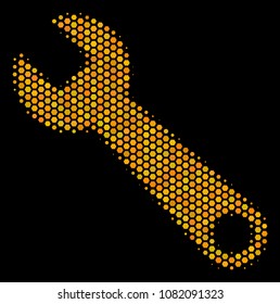 Halftone hexagonal Wrench icon. Bright golden pictogram with honeycomb geometric structure on a black background. Vector composition of wrench icon constructed of honeycomb blots.