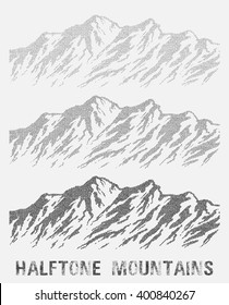 Halftone mountain range set. Black and white huge dotted isolated mountains. Vector illustration.