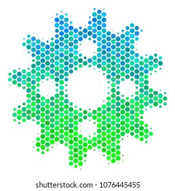 Halftone round spot Cogwheel icon. Icon in green and blue shades on a white background. Vector composition of cogwheel icon made of circle spots.