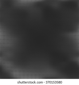 Halftone seamless vector background. Abstract halftone effect with white dots on black background.