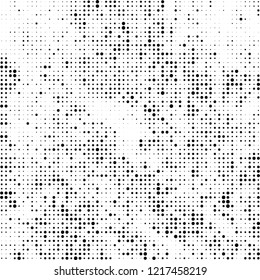 Halftone texture is black and white. The pattern of the ink points are randomly arranged. Vector monochrome background. Abstract the surface of chaos