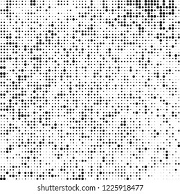 Halftone texture is black and white. The pattern of the ink points are randomly arranged. Vector monochrome background. Abstract the surface of chaos
