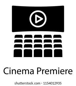 
a hall with the video playing in front of them depicting cinema premiere 
