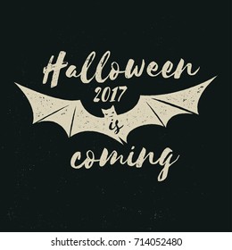 Halloween 2017 is coming. Vector Halloween retro badge. Concept for shirt or logo, print, stamp. Flying Bat. Halloween design. - stock vector.