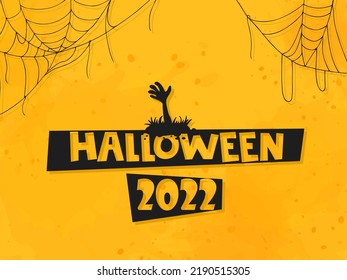 Halloween 2022 - October 31. Trick or treat. Vector hand-drawn doodle style. Lettering with a zombie hand sticking out of the grave, with cobwebs on an orange background with watercolor splashes.