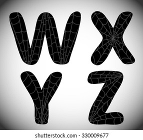 Halloween alphabet. Black letters w, x, y, z with spider web on them.