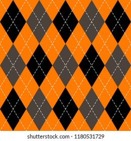 Halloween Argyle plaid. Scottish pattern in orange, black, gray and white  rhombuses. Scottish cage. Traditional Scottish background of diamonds . Seamless fabric texture. Vector illustration