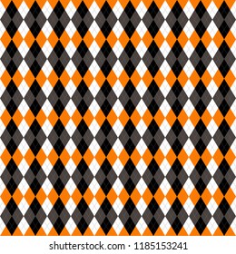 Halloween Argyle plaid. Scottish pattern in orange, black, gray and white  rhombuses. Scottish cage. Traditional Scottish background of diamonds . Seamless fabric texture. Vector illustration