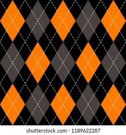 Halloween Argyle plaid. Scottish pattern in orange, black, gray and white  rhombuses. Scottish cage. Traditional Scottish background of diamonds . Seamless fabric texture. Vector illustration