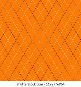 Halloween Argyle plaid. Scottish pattern in orange, black and white rhombuses. Scottish cage. Traditional Scottish background of diamonds . Seamless fabric texture. Vector illustration
