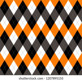 Halloween Argyle plaid. Scottish pattern in orange, black, white and grey rhombuses. Scottish cage. Traditional Scottish background of diamonds . Seamless fabric texture. Vector illustration