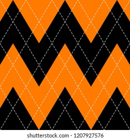 Halloween Argyle plaid. Scottish pattern in orange, black and grey rhombuses. Scottish cage. Traditional Scottish background of diamonds . Seamless fabric texture. Vector illustration